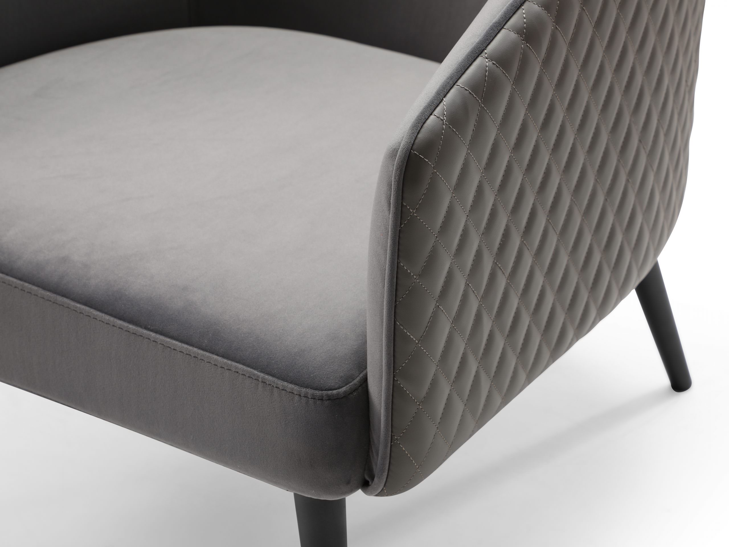 Boston Leisure Chair is available in great velvet fabric. The front, back, and seat are grey velvet fabric and the outside back is grey PU. It makes a great combination with the sanded black coated steel frame base.